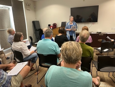 Photo of Recorder Thornton giving a presentation to a civic group